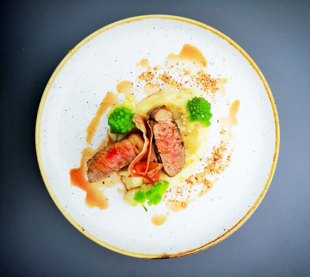 Top View Of Medium Rare Steak with Vegetables